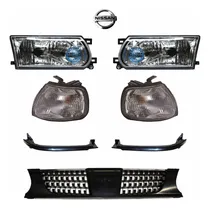 Comprar Kit Tsuru Iii 92-17 Faros Cuartos Biseles Parrilla Y Emblema