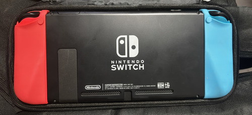 Console Nintendo Switch V1 32gb + 2 Jogos Originais + Mochila Case Película Acessórios Completos Azul-vermelho