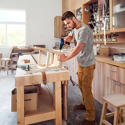 Taladro percutor atornillador inalámbrico de 10mm Bosch GSB 120-LI + 2 baterías de 2Ah + accesorio con maletín de transporte