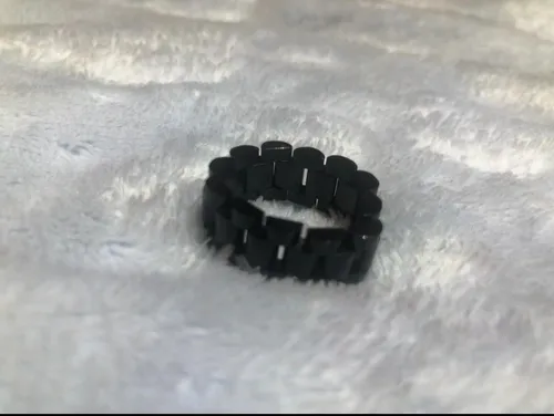 Anillo rolex negro clearance