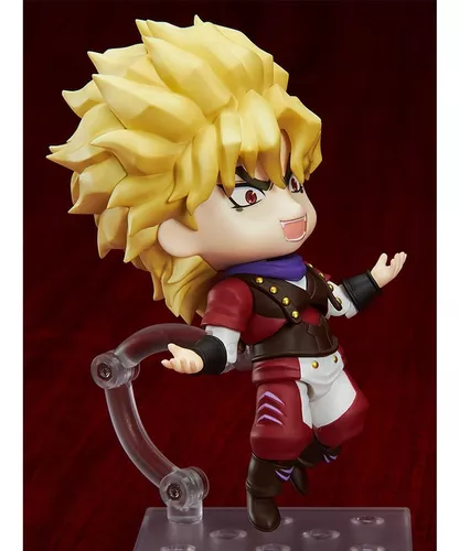 Luffy Toys - Personaje: Dio Brando Fabricante: Good Smile Company Linea:  Nendoroid Tamaño: 10 centímetros de altura aproximadamente. Material: ABS a  base de PVC. Accesorios: Incluye rostros extras intercambiables,manos y  multiples accesorios