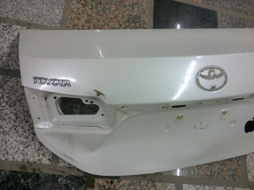 Tapa Baul Original Corolla 2014