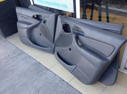Tapas De Puertas Ford Focus Sedan Mod: 00-04 (precio X C/u)