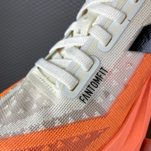 Tênis Corrida New Balance Fuelcell Rebel V4 Laranja Feminino