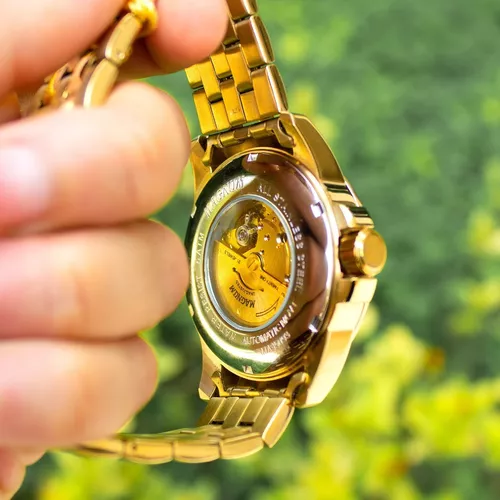 Relógio Magnum Automático Masculino Dourado Ouro 2 anos de garantia  MA33988H + carteira Lebrave no Shoptime