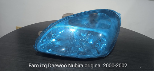 Faro Izquierdo/derecho Daewoo Nubira. 2000-2002. Original