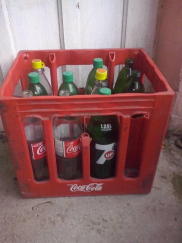 Cajon Coca Cola Con Botellas 1l1/4  4 Coca Cola Y 5 Sevenup