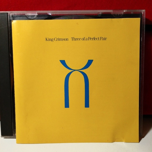 King Crimson Three Of A Perfect Pair Cd 1984 Leer Descripció