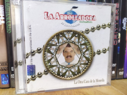 La Arrolladora Banda El Limon / La Otra Cara De La Moneda Cd (Usado)