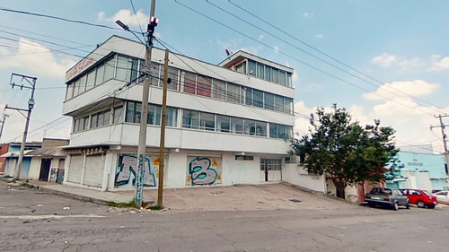 Edificio De Oficinas En Zona Comercial