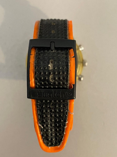Reloj Swatch Colección Analógico Negro/dorado Expandible Negro Y Naranja Amarillo Gris (Usado)