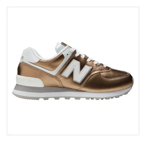 New balance blancas y doradas top