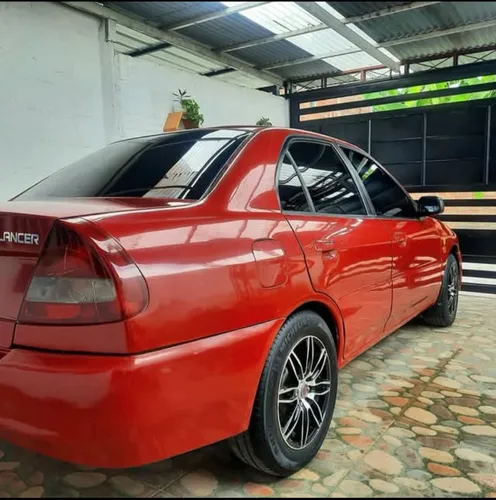 Mitsubishi Lancer 1.3 Gl 5 p