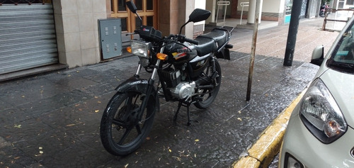 Suzuki Ax 100