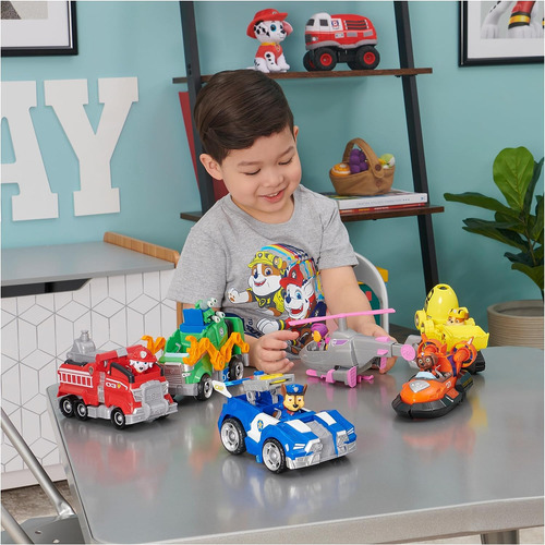 Paw Patrol, Rockys Deluxe Movie Transforming Toy Car Con Fig
