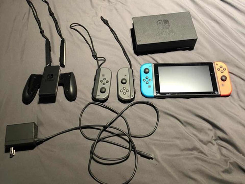 Nintendo Switch 32 Gb + 4 Controles + 4 Juegos. Impecable!!