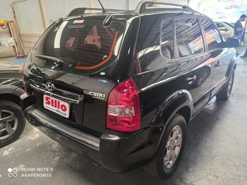 Imagem 10 de 13 de Tucson Gls 2.0 Automatica 2013 Preta 2 Dono Rev Concess Veja