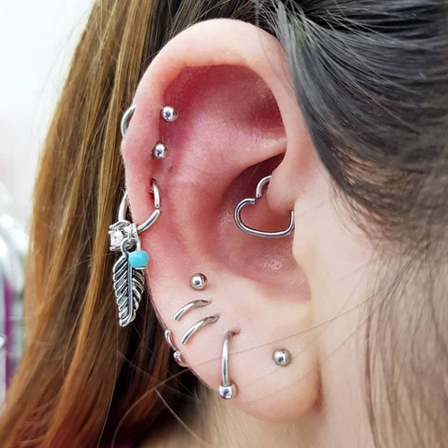 Imagen 2 de 6 de Argollita Pluma Piercing - Piercing Argenitna ®