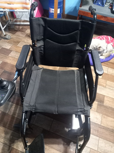 Cadeira De Rodas Motorizada. Paciente Não Se Adaptou.