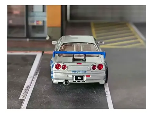 Miniatura Nissan Skyline Gt-r R34 C-west Apaxpo Kod 1:64 7cm