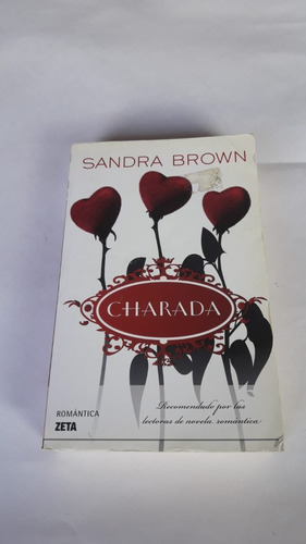 Libro Sandra Brown, Charada. Excelente Estado