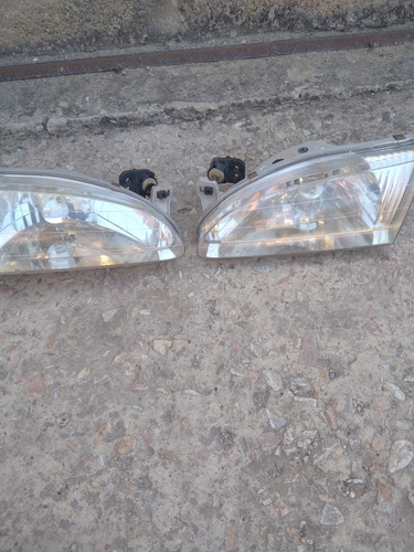 Faros Delanteros Toyota Camry Originales Año 97 Al 2000.