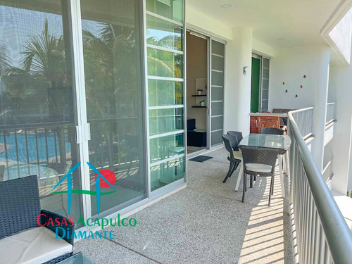 Cad Mayan Lakes 16 302. Amplia Terraza Con Vista A Las Áreas Comunes Y Acceso A Un Exclusivo Club De Playa