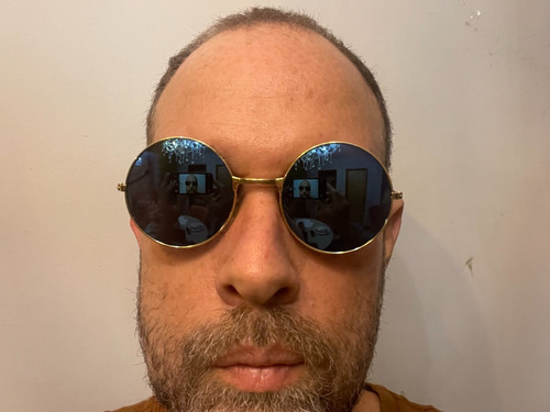 Gafas de sol redondas Motorhomestore con lente azul espejo y armazón dorado