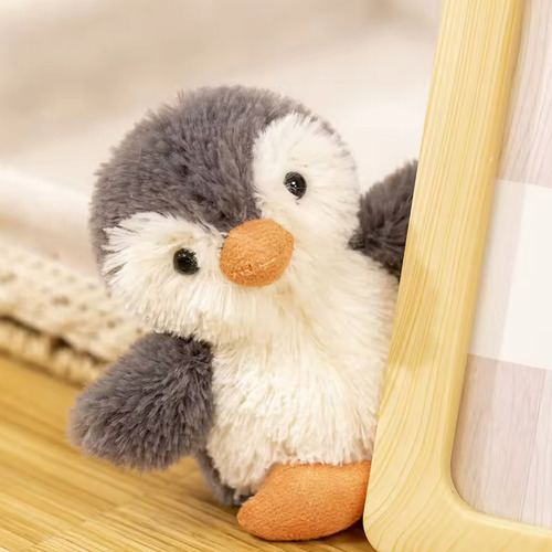 Pingüino gris con animales marinos de peluche, 22 cm