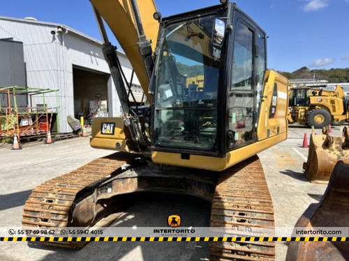 Excavadora Caterpillar 320 Eco.712