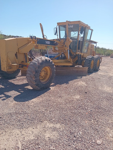 Motoniveladora Caterpillar 140k