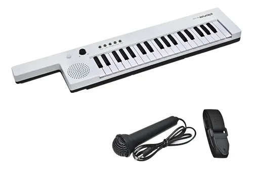 McGrey KT-3712 Teclado Infantil 37 Teclas (Keytar) con Correa y micrófono incluidos. Funciona con Pilas; Adaptador USB Opcional. 4 timbres, 4 ritmos y 10 Canciones Demo. Rojo