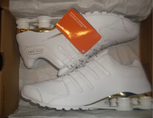 T nis Nike Shox Nz S L Com Dourado Cromado Import. Nike