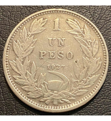 Moneda Chilena Un Peso. Año 1927 Águila Sobre Roca Plata 0,5