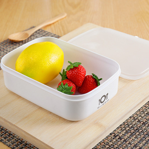 Un Recipiente De Almacenamiento De Alimentos Con Tapa De Dos