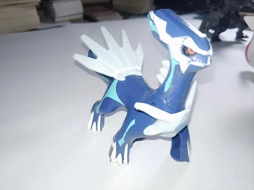 Foto de Modelo Plástico De Um Brinquedo De Pokemon Dialga Da Refeição Feliz  De Mcdonald S Em Um Fundo Azul e mais fotos de stock de Pokémon - iStock