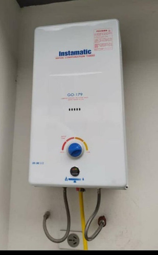 Imagen 3 de 10 de Calefon Instamatic 26 Ltr +kit+valvula+tanq D Gas Instalado