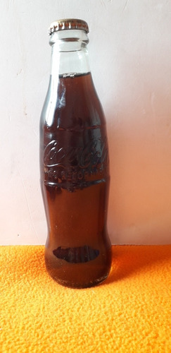 Botella Coca Cola Tapa Dorada  Llena Año 2006
