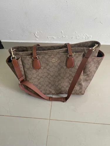 Pañaleras de marca coach hot sale