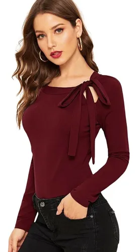 Blusas con moño online en el cuello