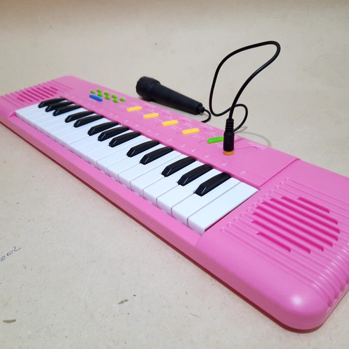 Imagem 5 de 7 de Teclado Infantil Rosa Com Microfone - Musical Resistente