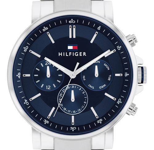 Reloj pulsera Tommy Hilfiger 1710588 con correa de acero color plateado - fondo azul