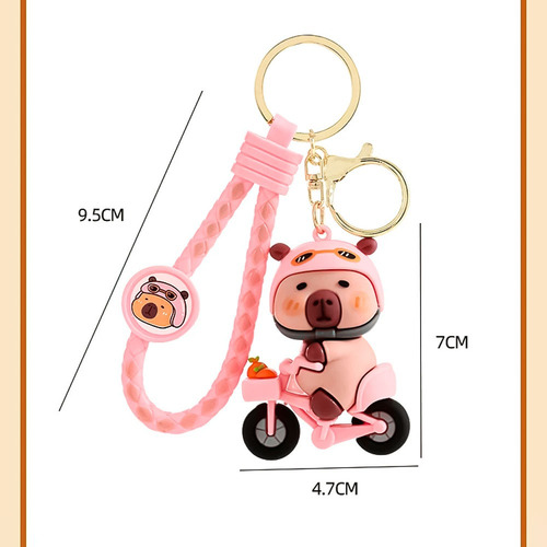 Llavero Pvc Suave Con Ganchito Carpincho Capybara Ciclista Celeste