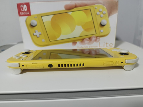 Nintendo Switch Lite Amarelo Destravado + 10 Jogos Digitais Amarelo (Usado)