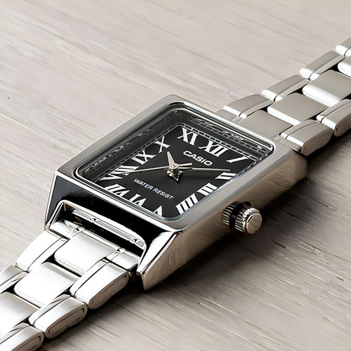 Reloj Casio Mujer Ltp-v007 Acero Análogo 100% Original Color De La Correa Plateado Color Del Bisel Plateado Color Del Fondo Negro