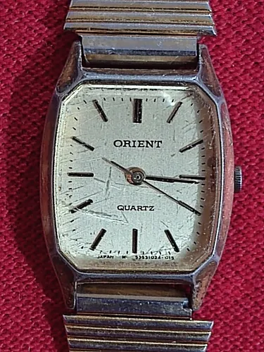 Reloj orient quartz clasico dorado sale
