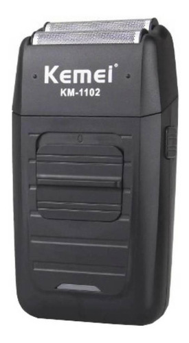 Afeitadora Kemei KM-1102 negra 110V/220V