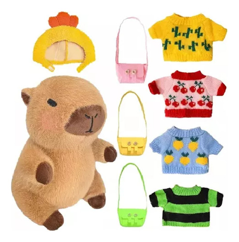 Peluche Capibara Con 9 Piezas De Ropa Y Accesorios E