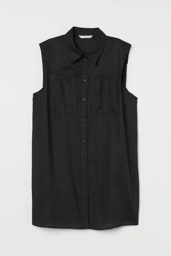 Camisa negra sin manga sale