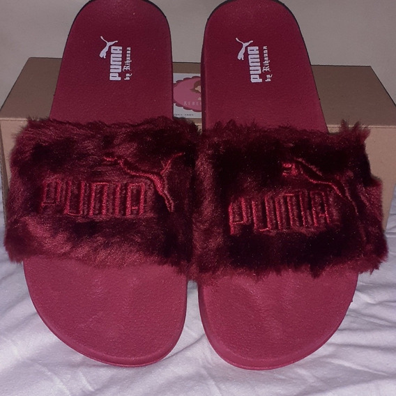 chinelo slide puma pelucia